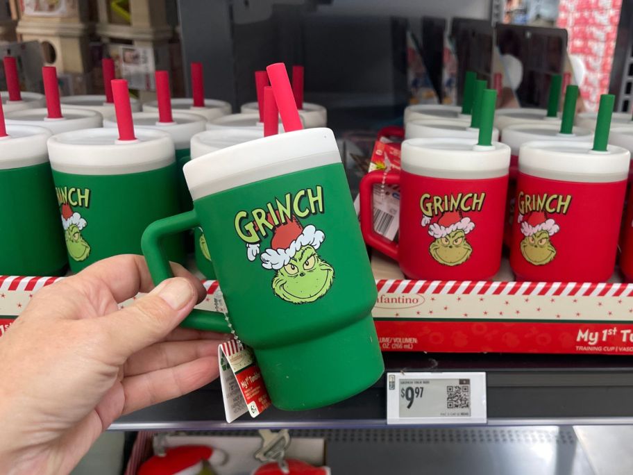 hand holding green Infantino My 1st 9oz Tumbler in store