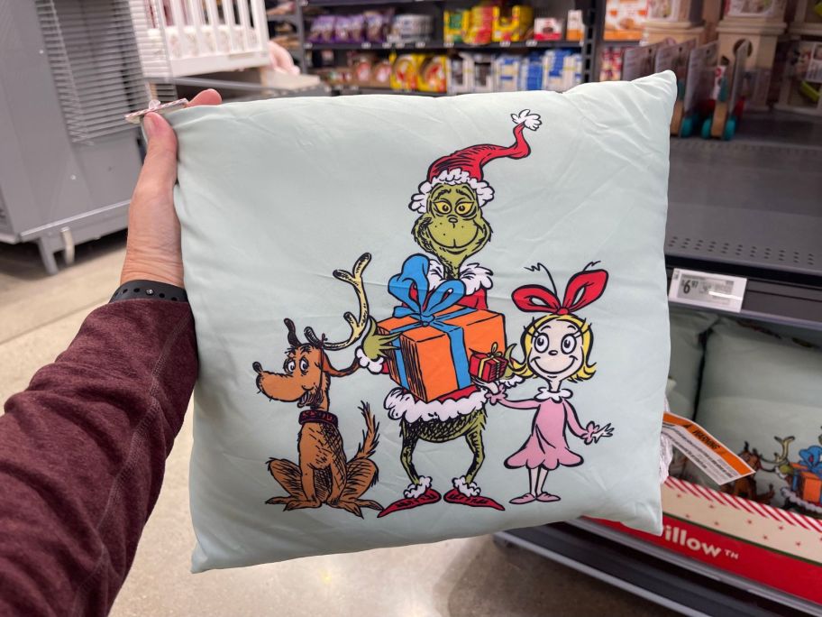 Infantino The Grinch Soft Pillow in hand in store