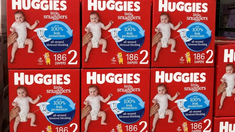 boxes of huggies diapers stacked in a store