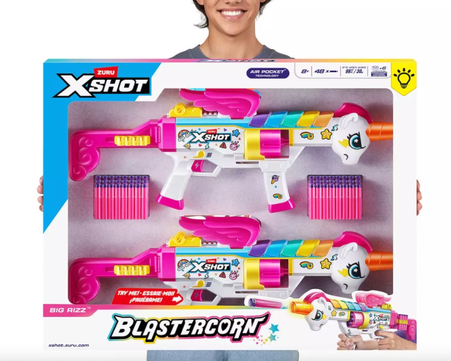 boy holding big box with unicorn blasters