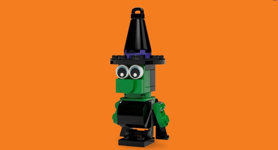 lego witch with orange background