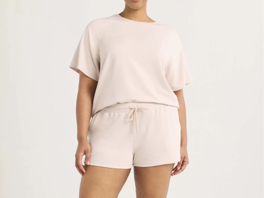 woman wearing light colored lounge set