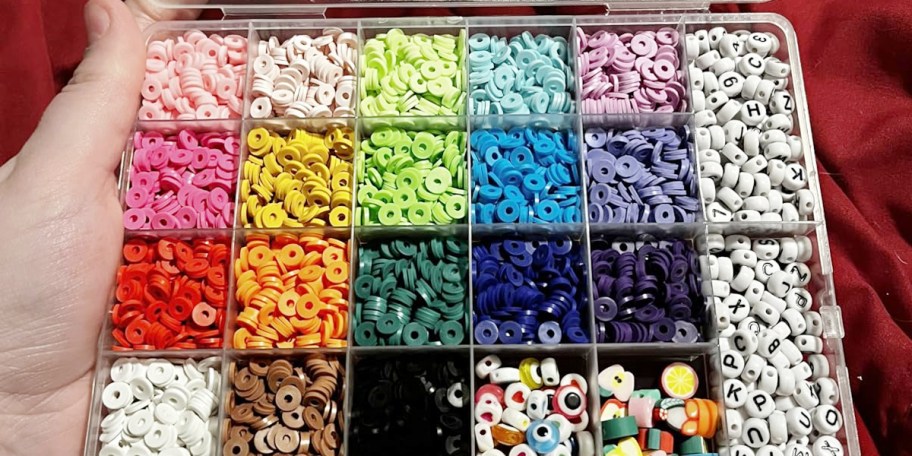 hand holding bracelet making kit