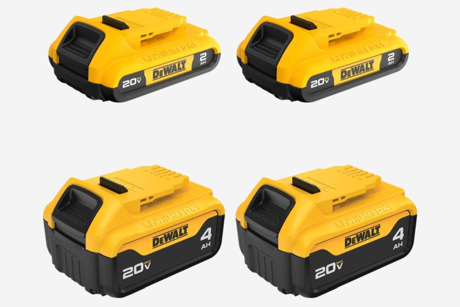 four yellow powertool batteries