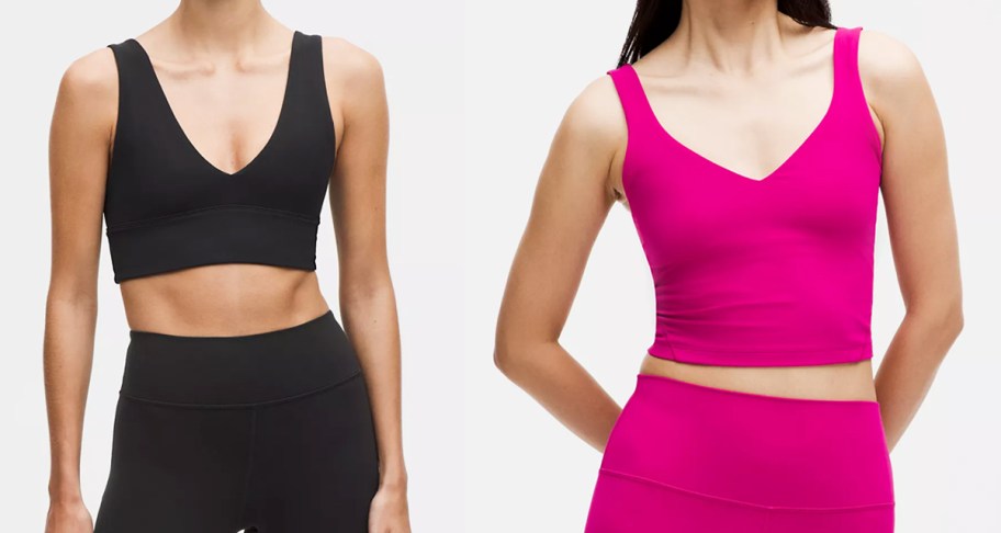 two women in black and pink sports bras