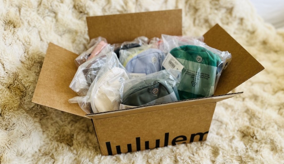 lululemon box filled with beltbags