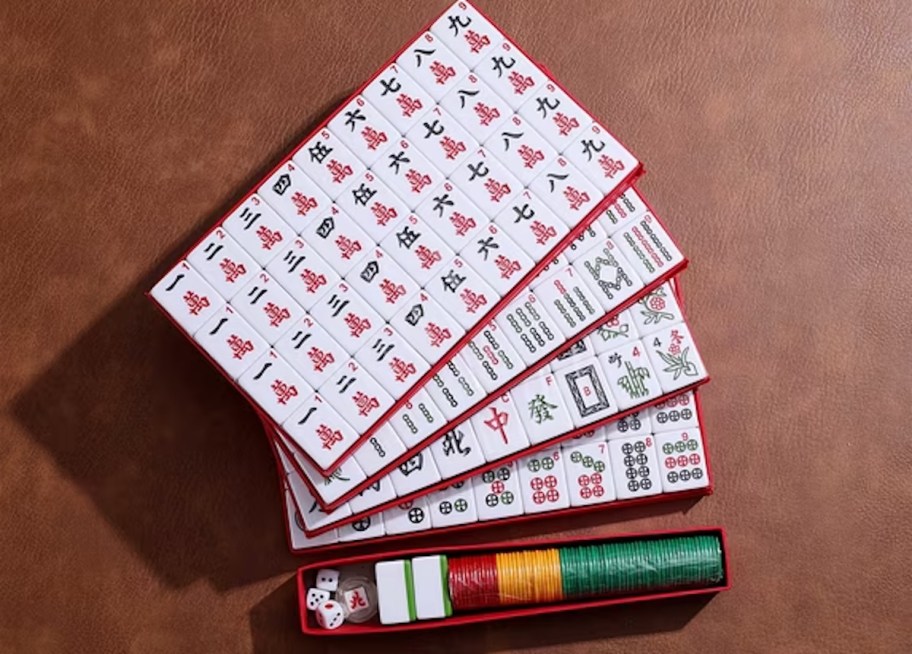 mahjong in case on wood table