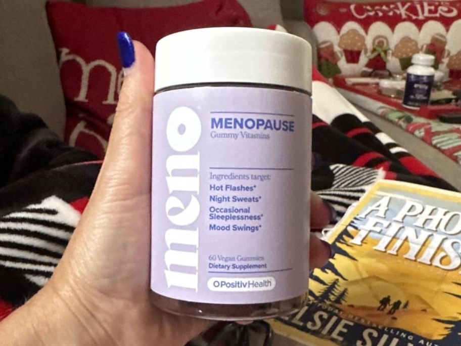 O Positiv Menopause Vitamin Gummies 60-Count bottle in hand