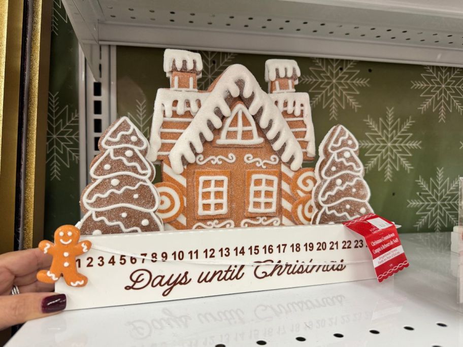 Gingerbread House Christmas Countdown in shelf in store