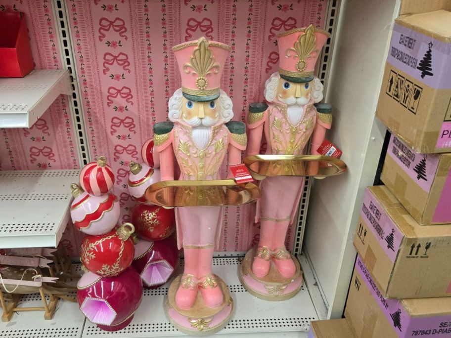 Pink Nutcracker w/ Tray Tabletop Décor on shelf in store