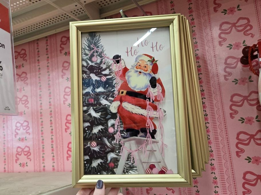 Santa Decorating Tree Wall Décor hanging in store