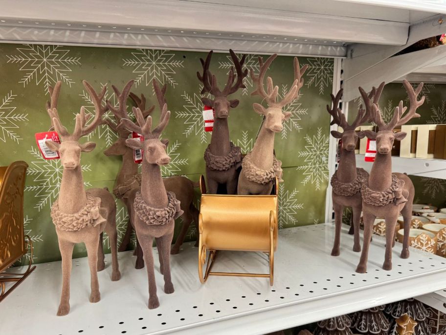 Flocked Standing Deer Décor on shelf in store
