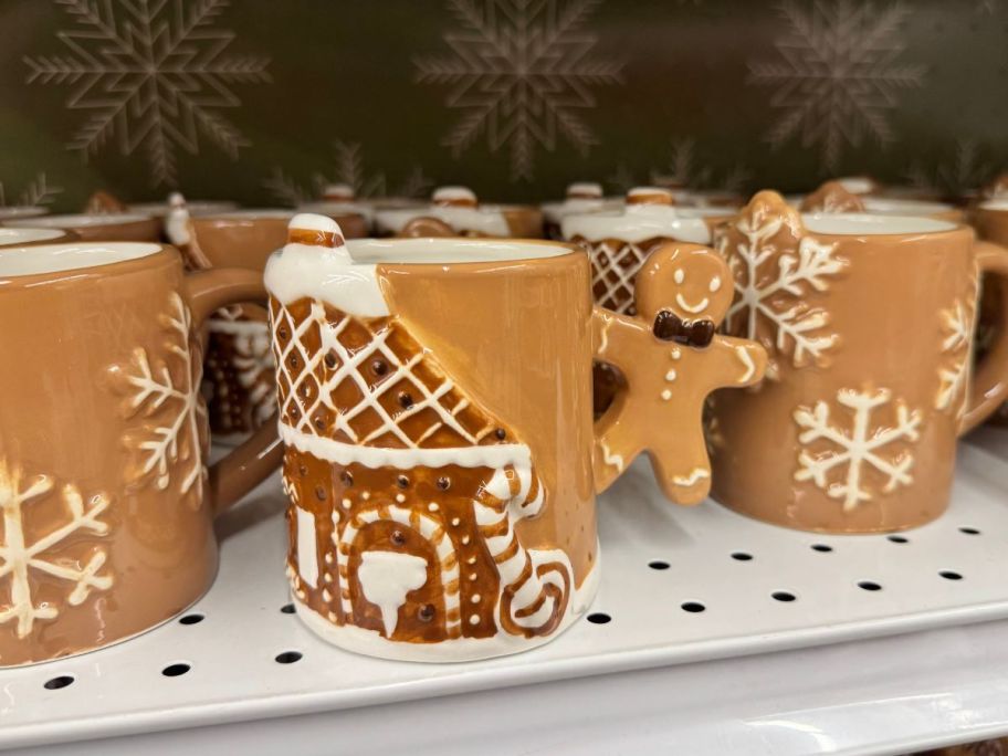 Gingerbread House Mugs on shelf in store