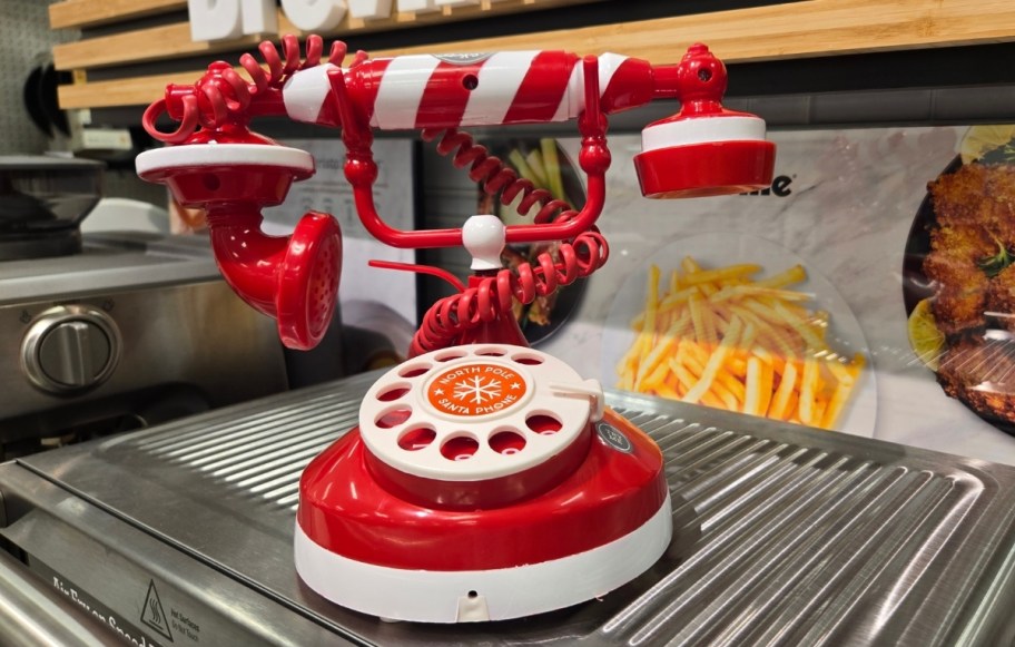 a red and white old school telephone