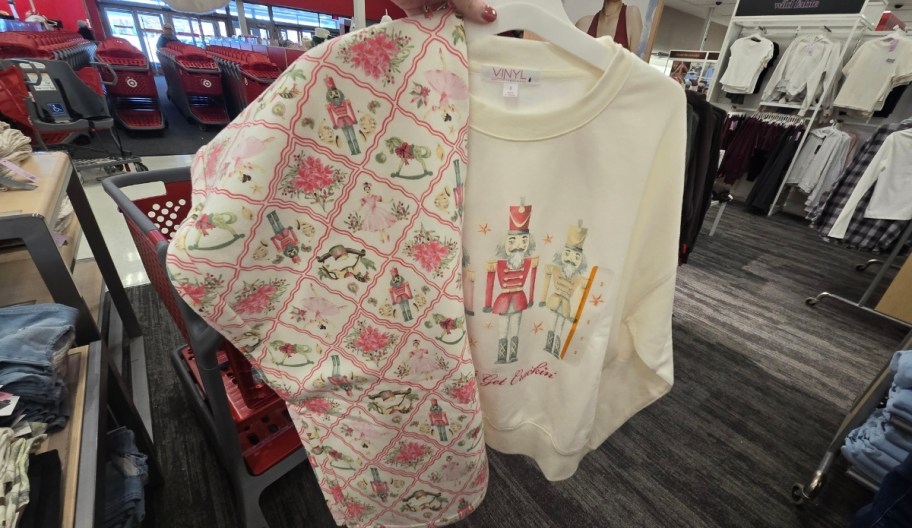 a graphic sweatshirt and sweatpants