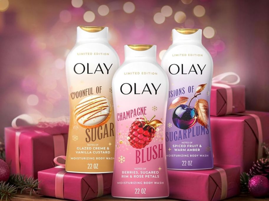 3 bottles of holiday Olay Body wash scents