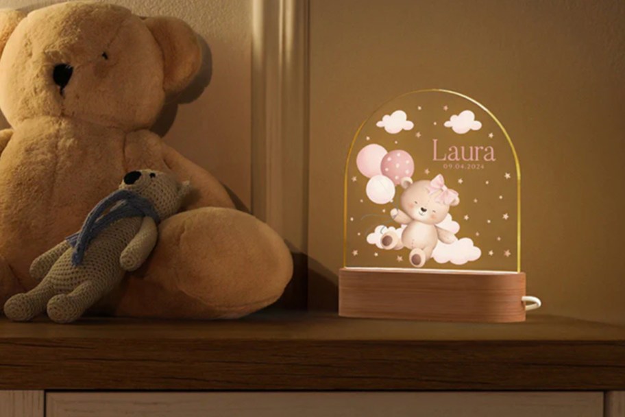 arched LED nightlight with bear next to teddy bear