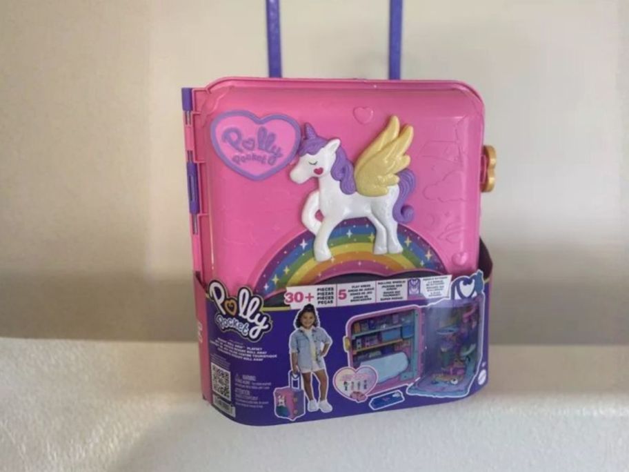 Polly Pocket Dolls Pollyville Resort Roll Away Playset