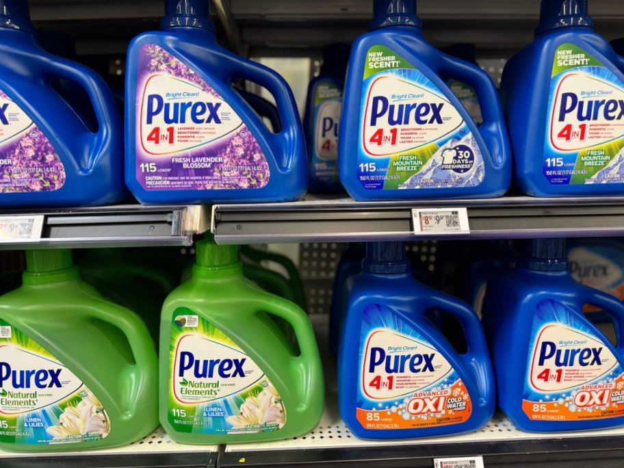 bottles of purex lined up on a walmart shelf