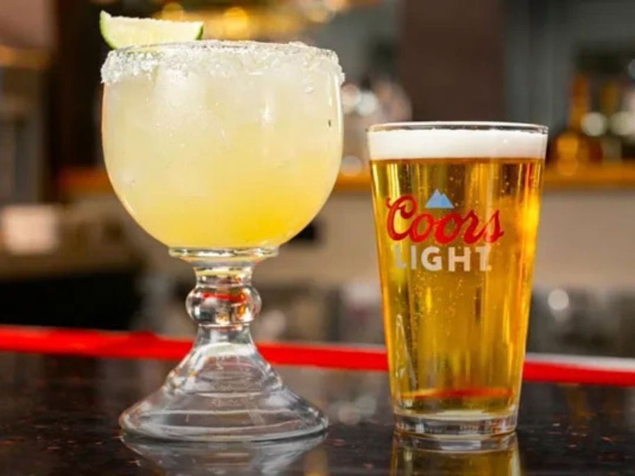 a house margarita and Coors Light Pint on table in restaurant