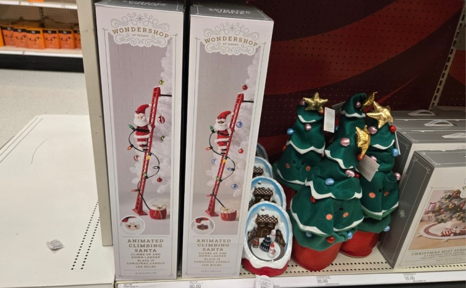 santa on a ladder figurines 