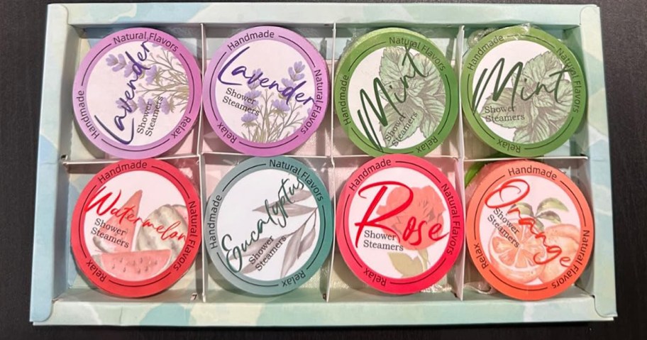 a box of 8 shower steamers sitting on a table