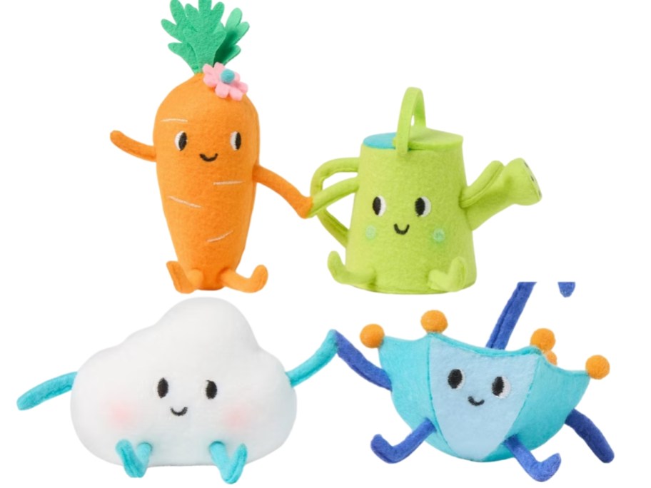 a felt carrot and watering can duo and a felt cloud and umbrella duo