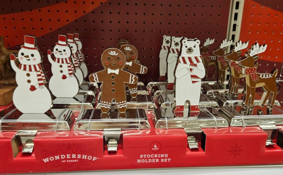 a set of christmas themed stocking holders