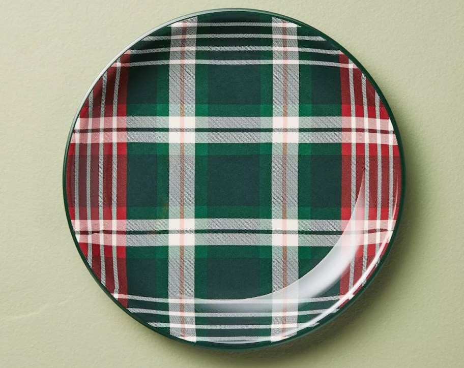 green red and white plaid plate on green background