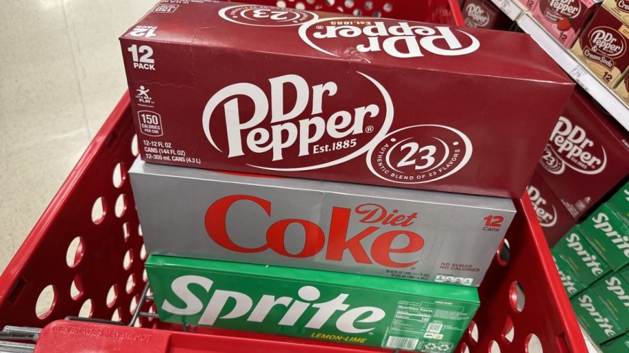 3 soda 12-packs in a target shopping cart