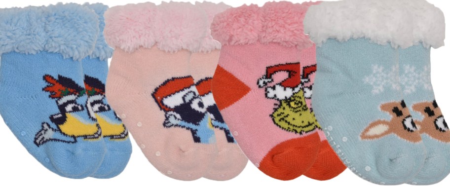 two pairs of pink and two blue christmas socks