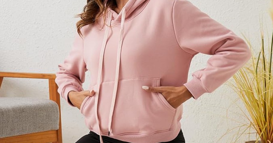 woman wearing a pink sherpa hoodie
