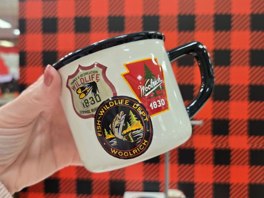 Woolrich Ceramic Badges Mug in hand in store