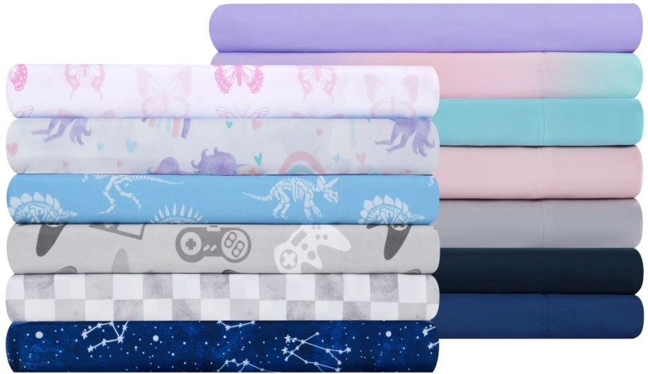kids sheet sets folded and stacked to show color options
