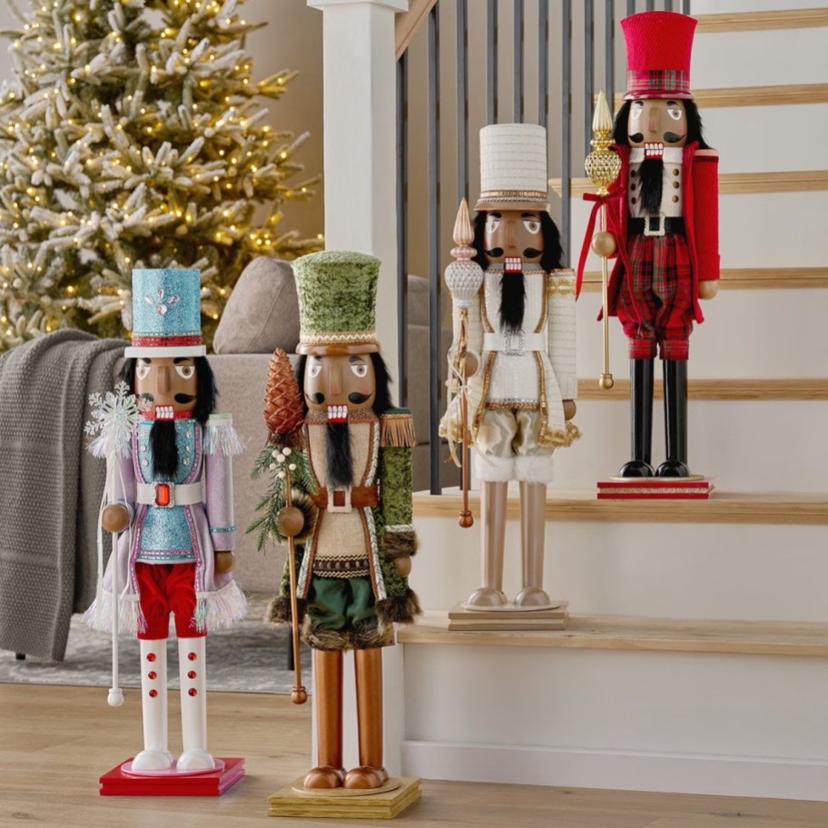 four large Nutcrackers on a set of stairs