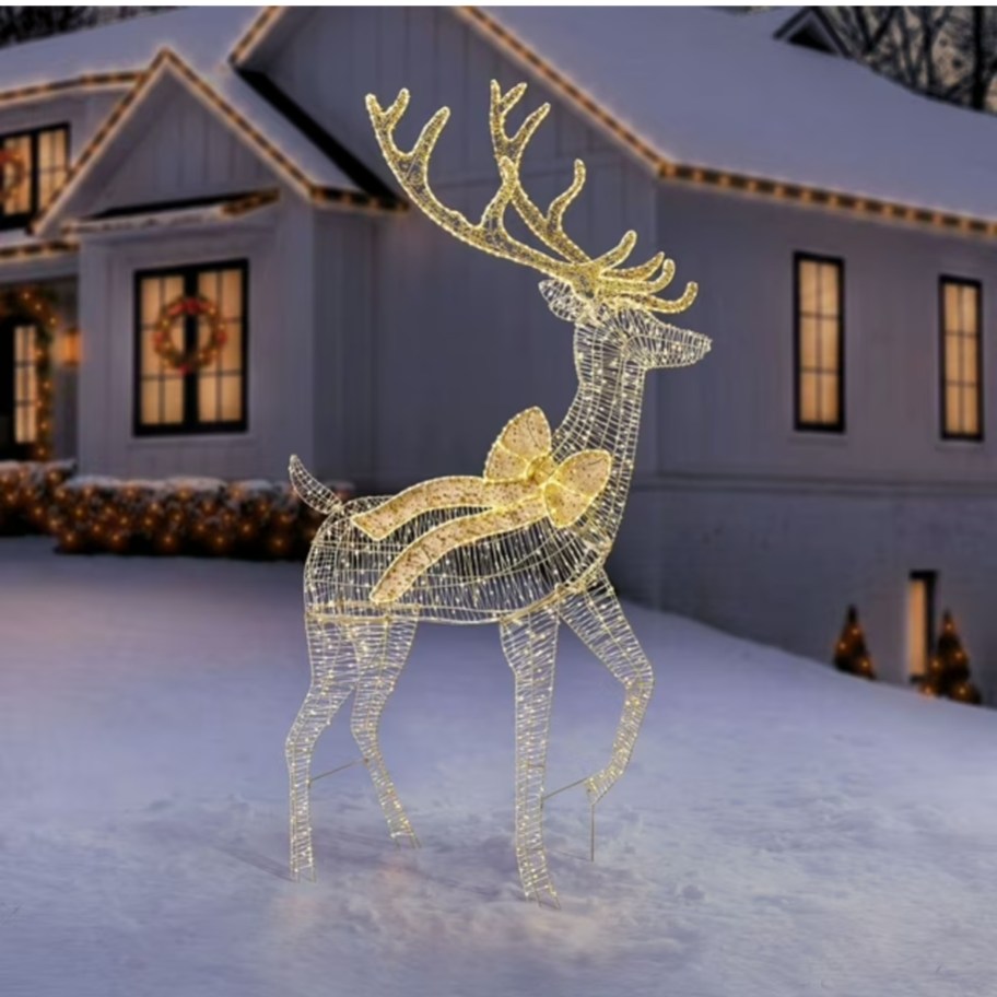a large pre-lit Buck Christmas decor in a yard