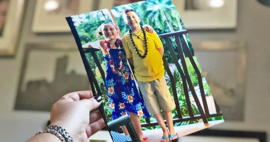hand holding an 8x10 photo print