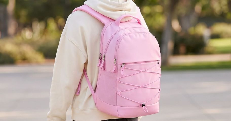 girl wearing pink All In Motion 21L Sporty Backpack in Pink