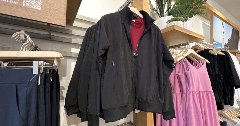 black bomber jacket on display in athleta store