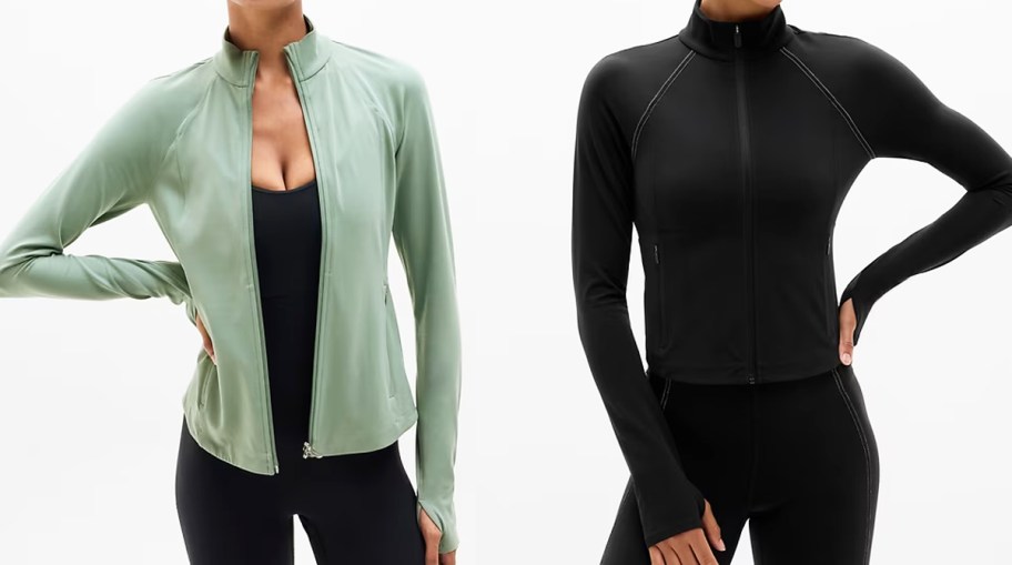 two women in green and black jackets