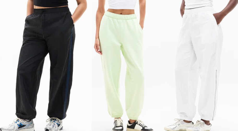 women in black, green, and white joggers