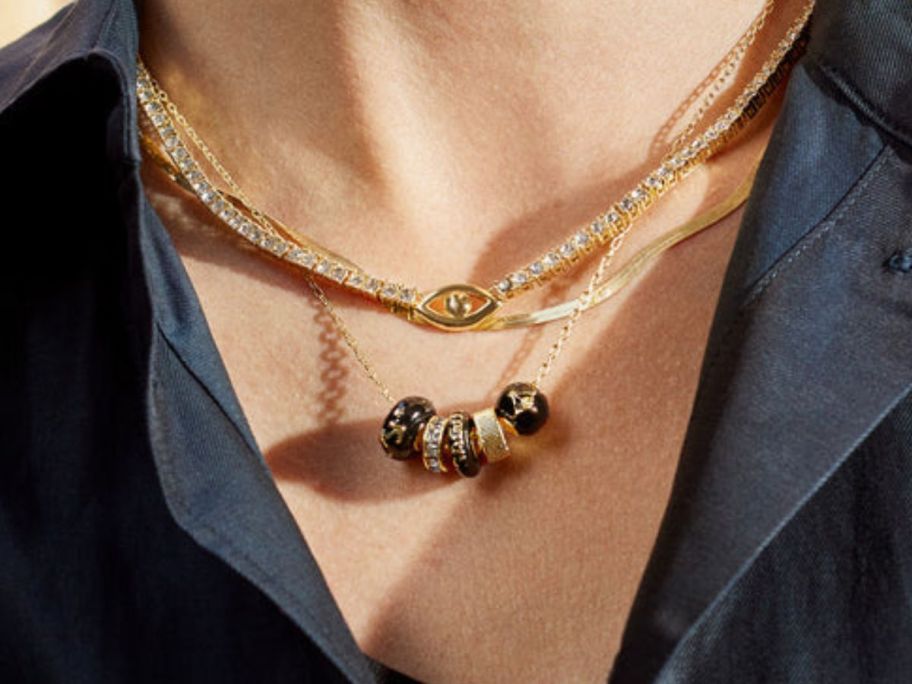 neck displayed with Baublebar Zodiac Charm Necklace 