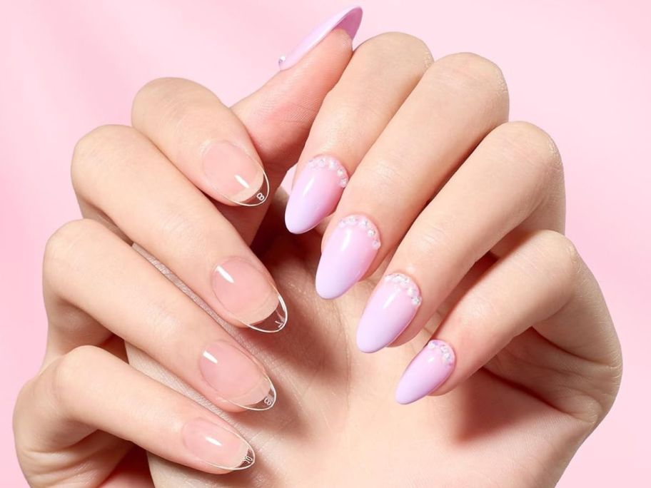 Two hands with unpainted and painted Beetls Gel Nails