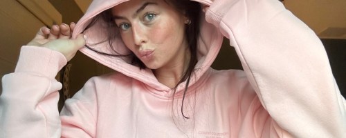 Young girl wearing pink comfrt hoodie