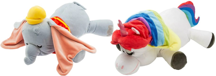 Two stuffed animals on a white background. Left: Dumbo with big ears and a yellow hat. Right: An inside-out unicorn with a rainbow mane and tail.