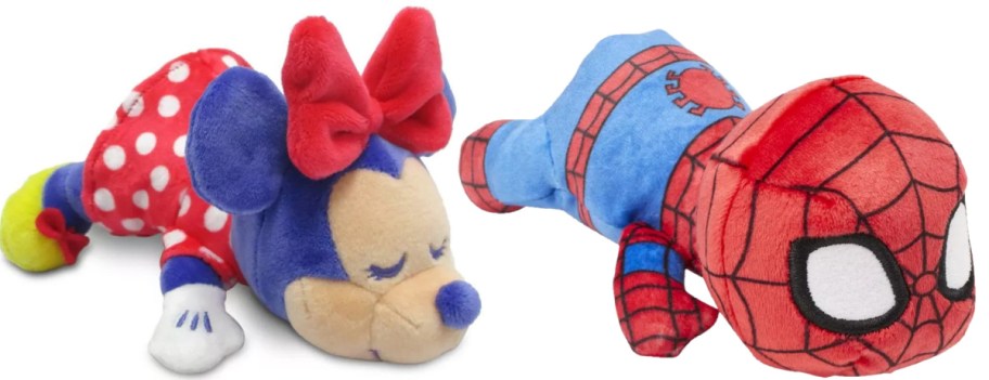 Two stuffed animals will appear. One resembles Minnie Mouse in a purple and red costume, and the other resembles Spider-Man in red and blue, both lying down.