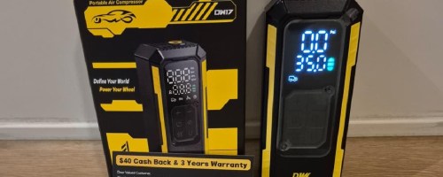 Portable air compressor displayed next to its box.