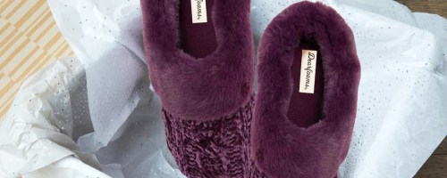 pair of purple slippers in a gift box