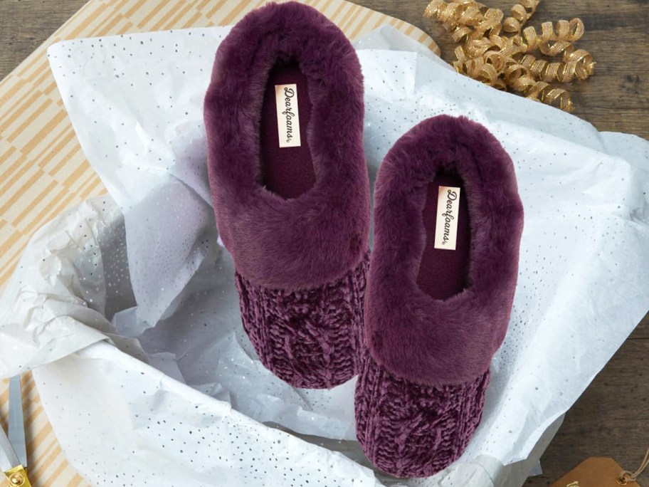 pair of purple slippers in a gift box