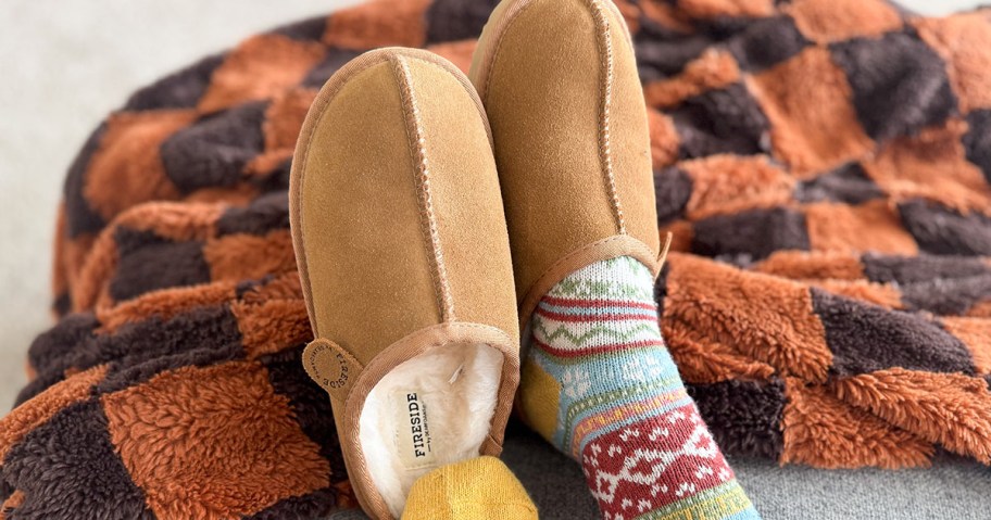 woman wearing Dearfoams Women's Fireside Greta Genuine Shearling Clogs